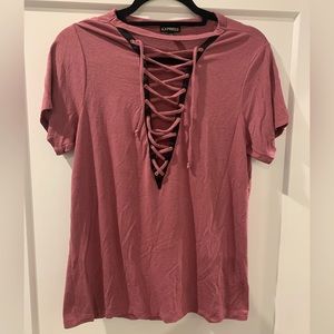 Deep v lace up pink top. Size small.